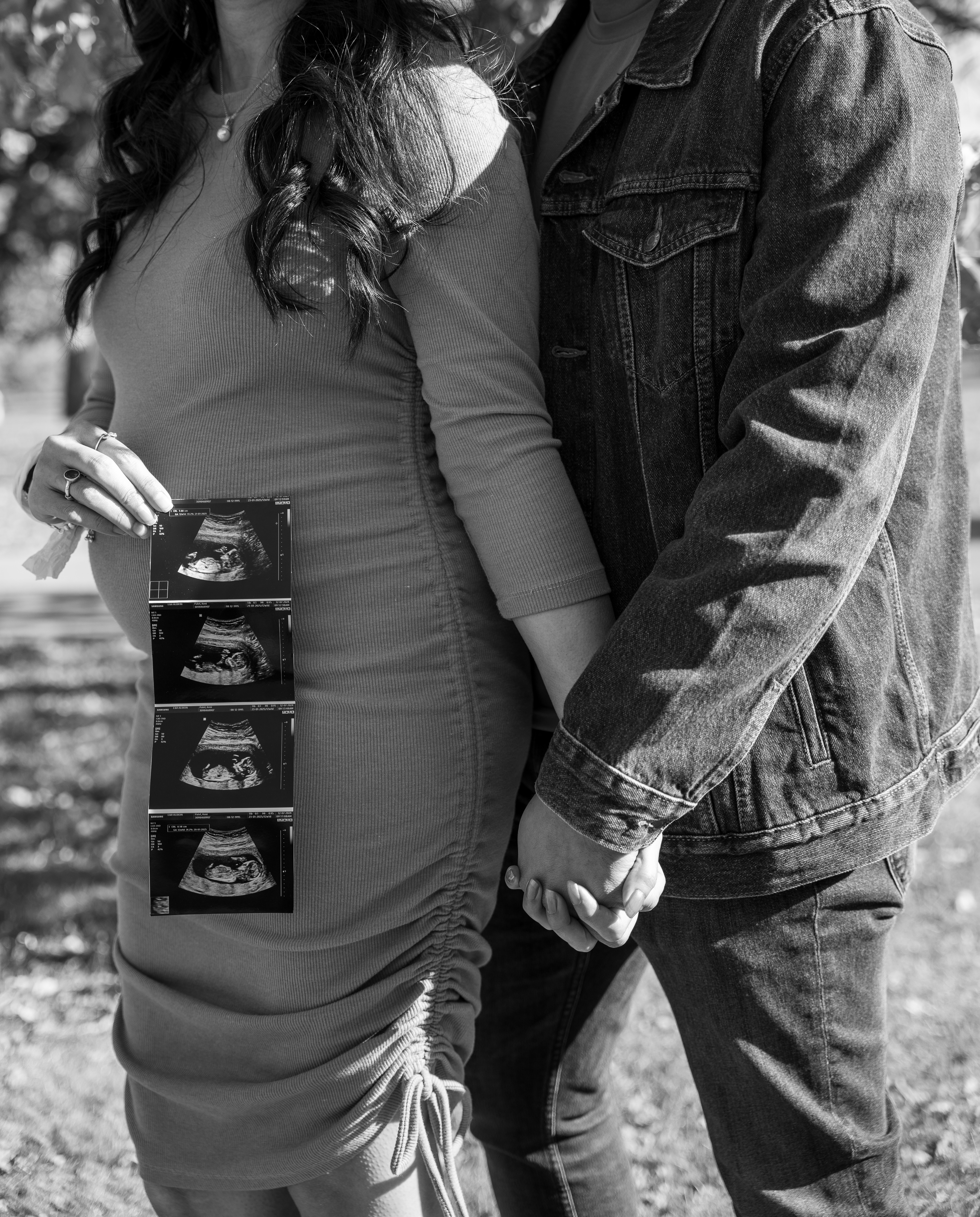 Couple with ultrasound photos